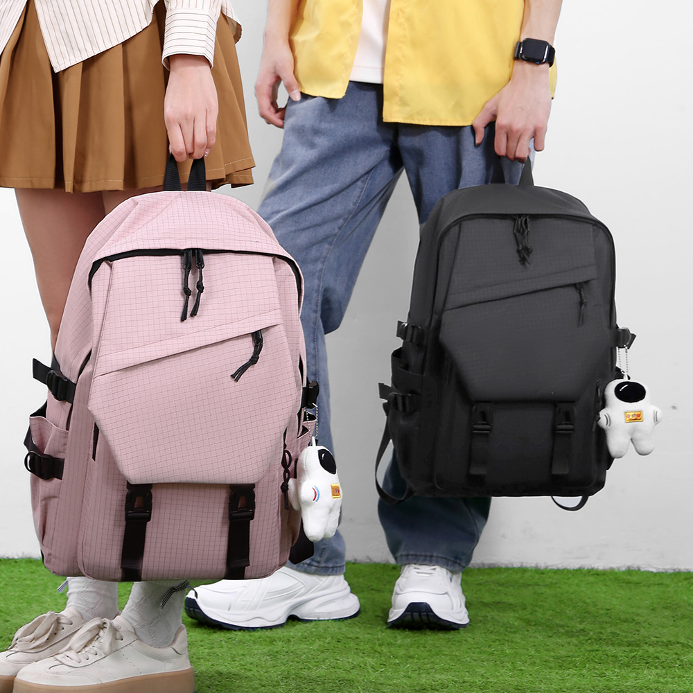 Parejas coreanas lindas bolsas escolares de estudiantes de gran capacidad para la temporada escolar simple versátil mochila transpirable mayorista