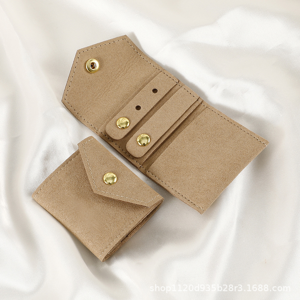 Spot microfibra portátil multifuncional mini joyería rollo de joyería pendiente anillo pendiente collar bolsa de protección de almacenamiento