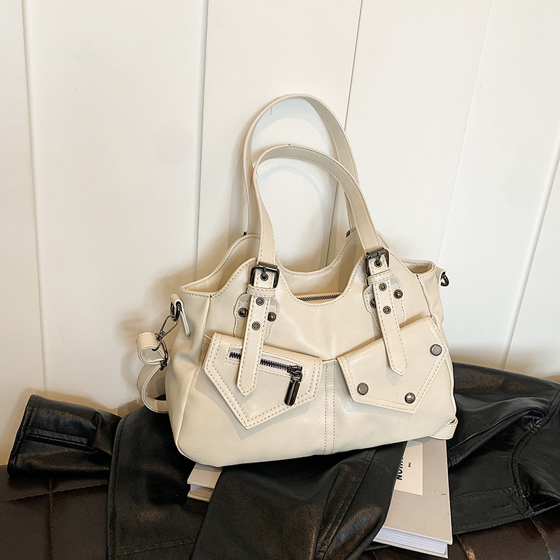 2024 transfronterizo retro Europa y América de gran capacidad bolso de hombro nuevo bolso de mochila empalmado bolso de mujer simple bolso de remaches bolso de mujer