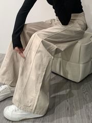 レトロなアメリカの砂杏色の工装ジーパン