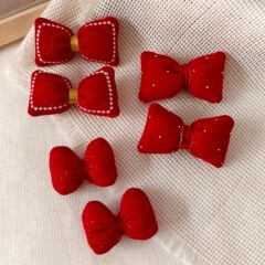 布芸の赤い蝶結びの髪飾り部品のシルクの綿の枕の服装の靴の靴下のアクセサリのDIYのアクセサリーの装飾品