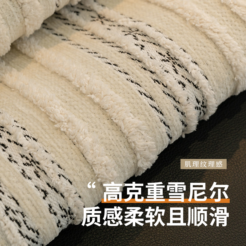 Sofá de alta sensación cojín de otoño y invierno 2025 nuevo tipo de línea recta de una sola pieza antideslizante cojín de forma especial cuatro estaciones tela universal