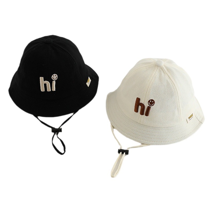 Sombrero para bebés estilo coreano simple letras bordadas sombrero de pescador primavera y verano bebé fuera sombrero solar