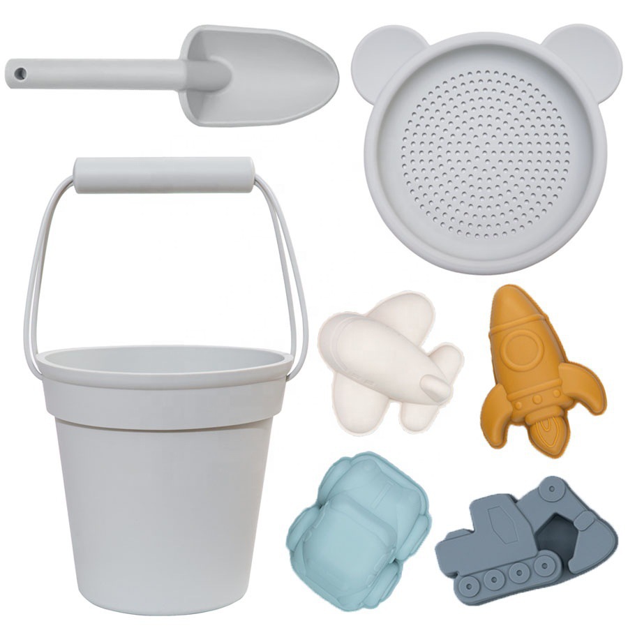 Jugar herramientas de arena Material de silicona Cubo de arena junto al mar Jugar herramientas de arena silicone beach toys