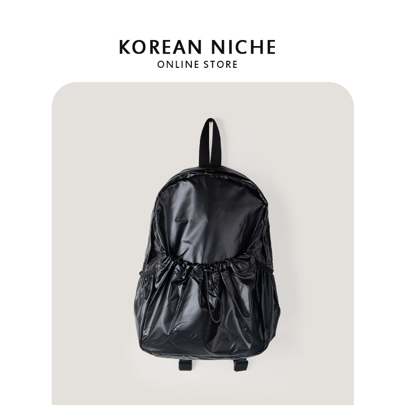 2023 nueva plata textura cordón mochila de gran capacidad casual mochila mujer nicho diseño perezoso estilo mochila