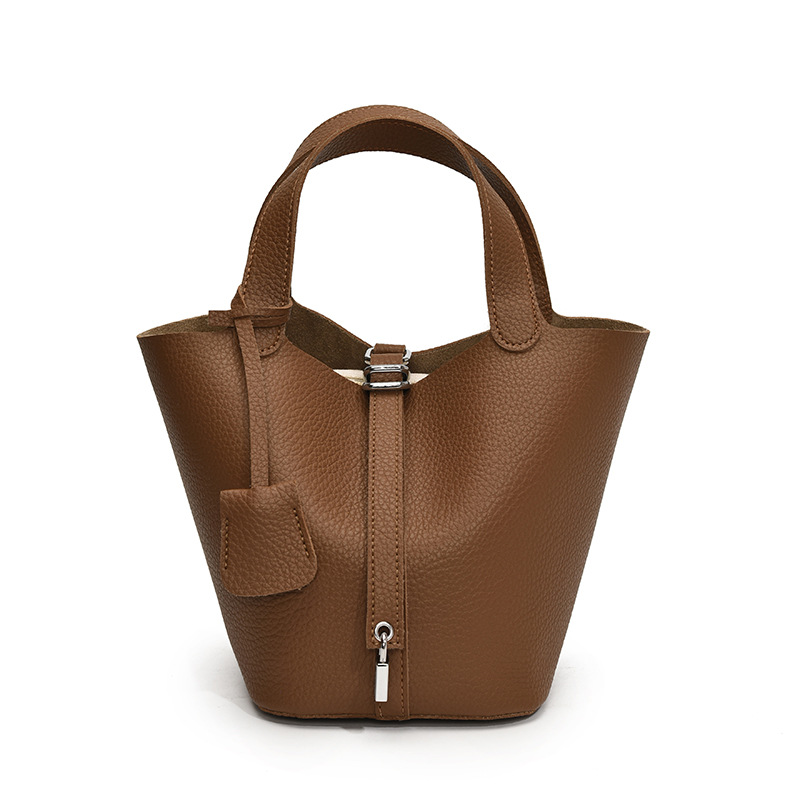 Bolsos de cesta de verduras de estilo caliente de comercio exterior para mujer 2025 nuevo bolso de cubo de ocio simple bolso femenino de alta gama de nicho