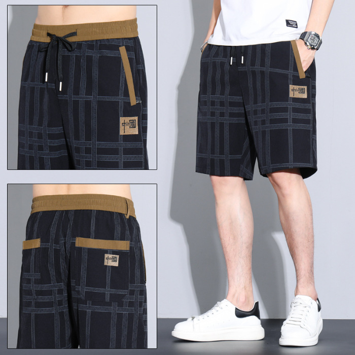 Black and silver [five-quarter pants]