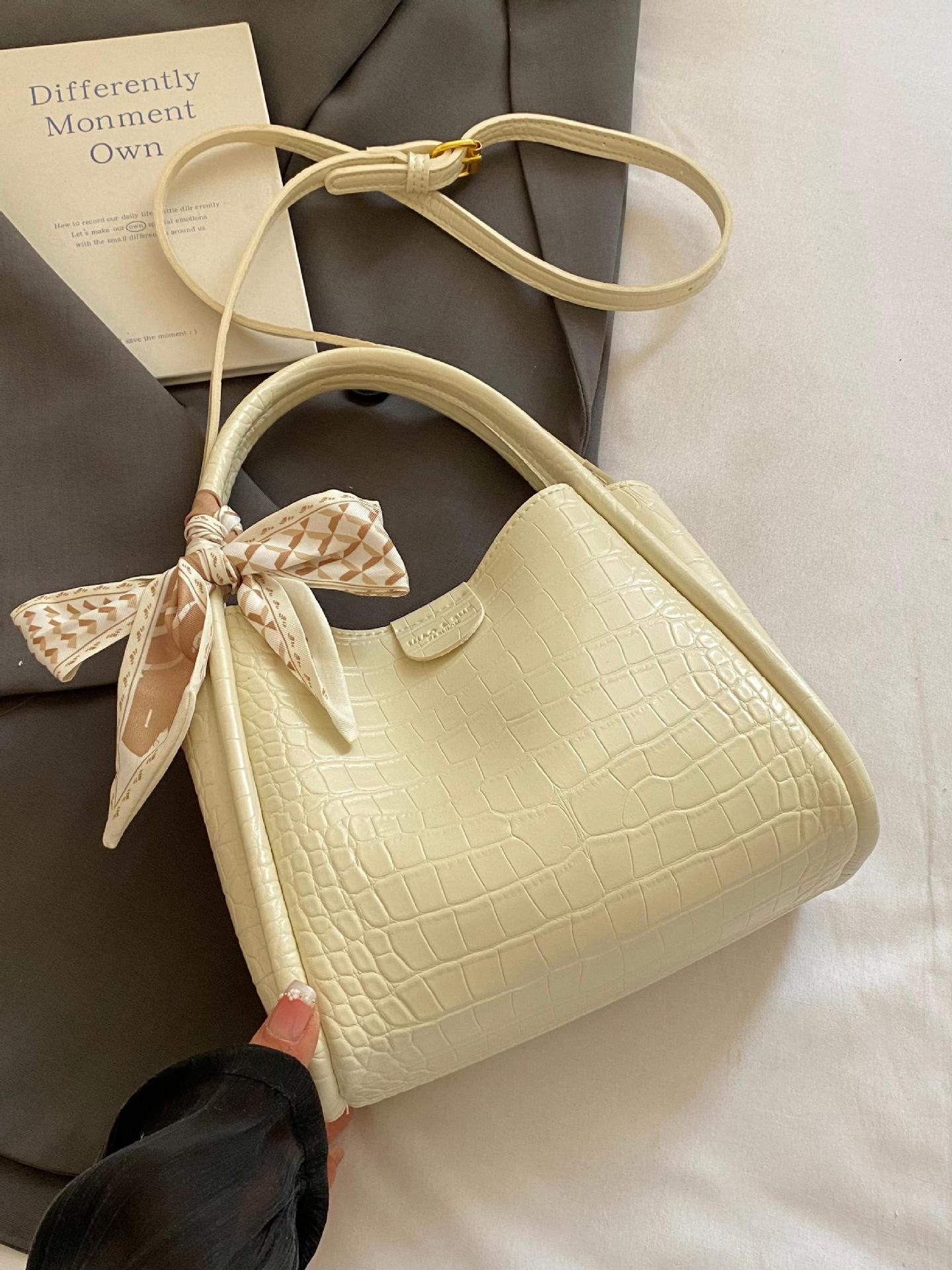 Bolso de mano de canasta de verduras de alta gama de nicho para mujer 2025 nuevo producto de comercio exterior bolso de cubo con patrón de cocodrilo bolso de mensajero de cercanías