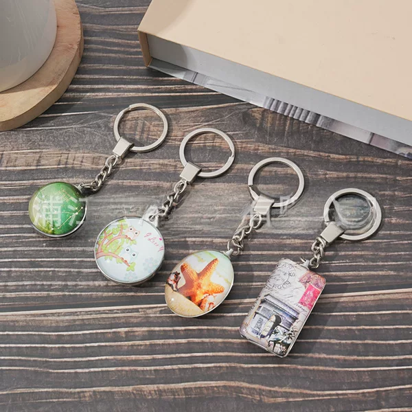 Amazon hot selling creative double-sided Time Gem keychain pendant metal key chain pendant bag wholesale