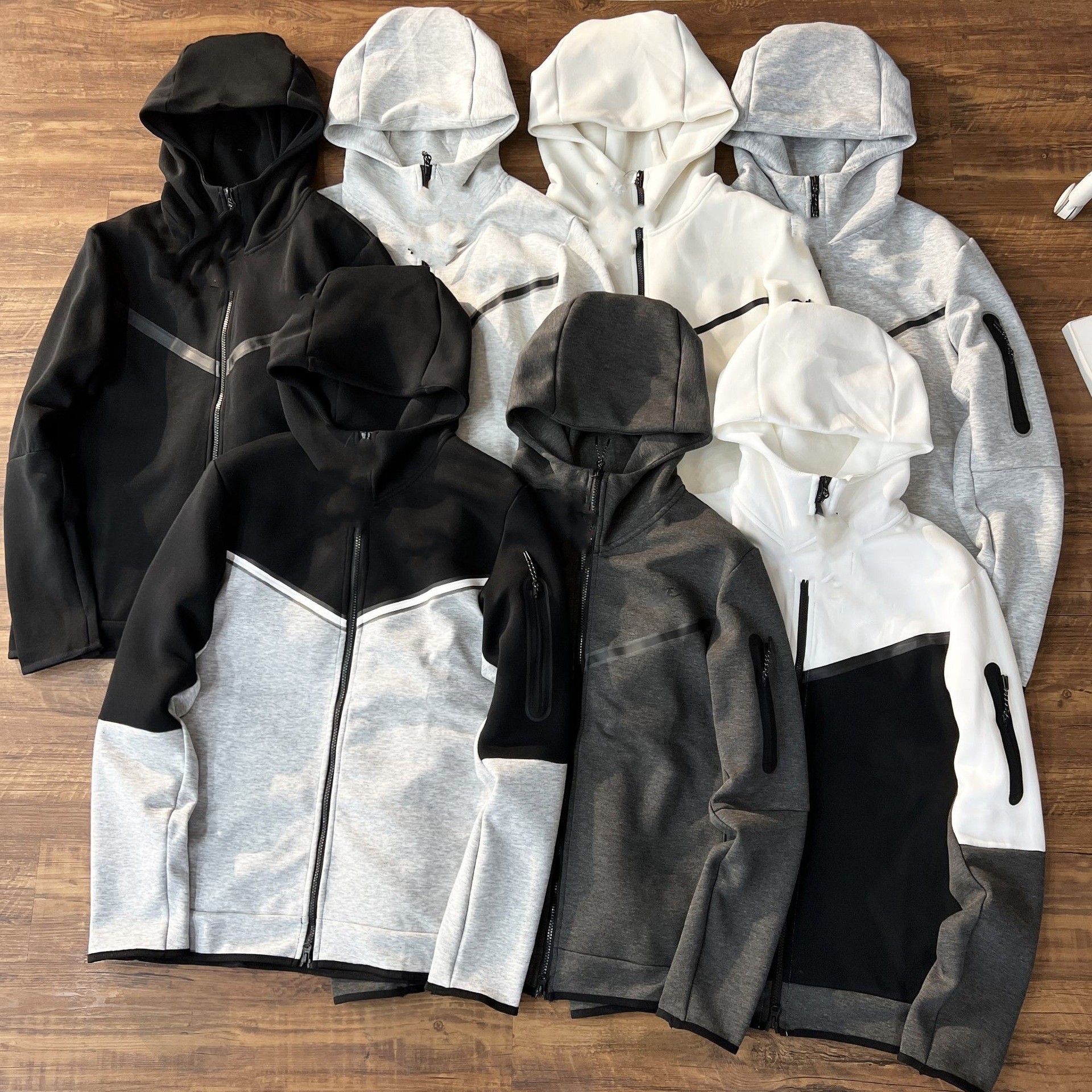 Chaqueta de hombre de primavera y otoño, nuevos productos de primavera y otoño, camisa con cremallera con capucha de punto de algodón con capa de aire, chaqueta deportiva y casual