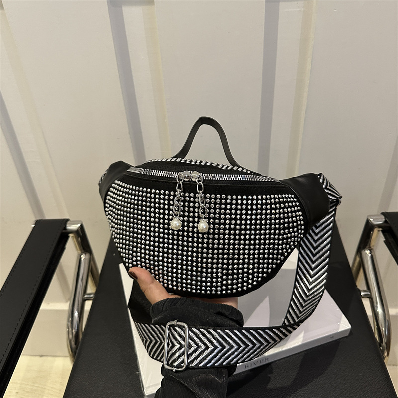 Nueva sensación de alta calidad bolso de diamante brillante coreano, bolso de hombro de moda, lujo ligero, bolso de pecho portátil con cinturón ancho de diamante caliente.