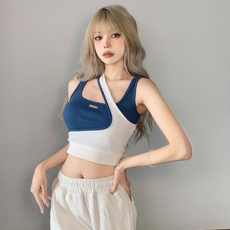 ギャルのベストの女性団風のジャズダンスの修身の短いタイプの臍を露出して踊る上着は色の偽の2つの不規則な外着にぶつかります。