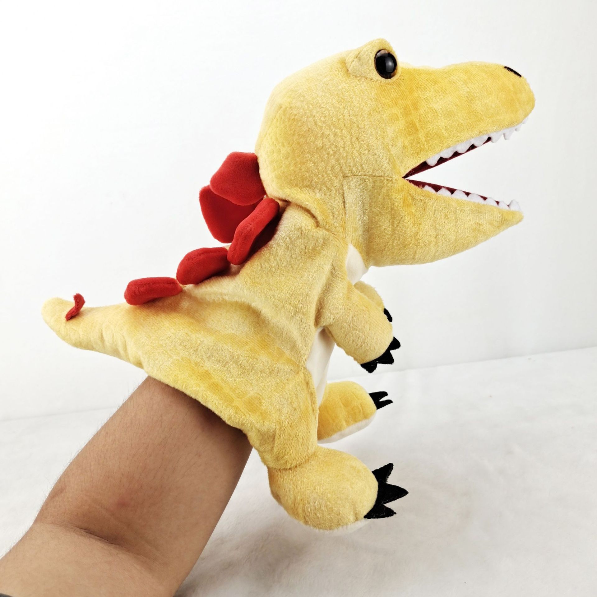 Dragón año dinosaurio en stock juguete de peluche Canglong animal educativo muñeca de títeres kindergarten historia contando apoyos muñeca