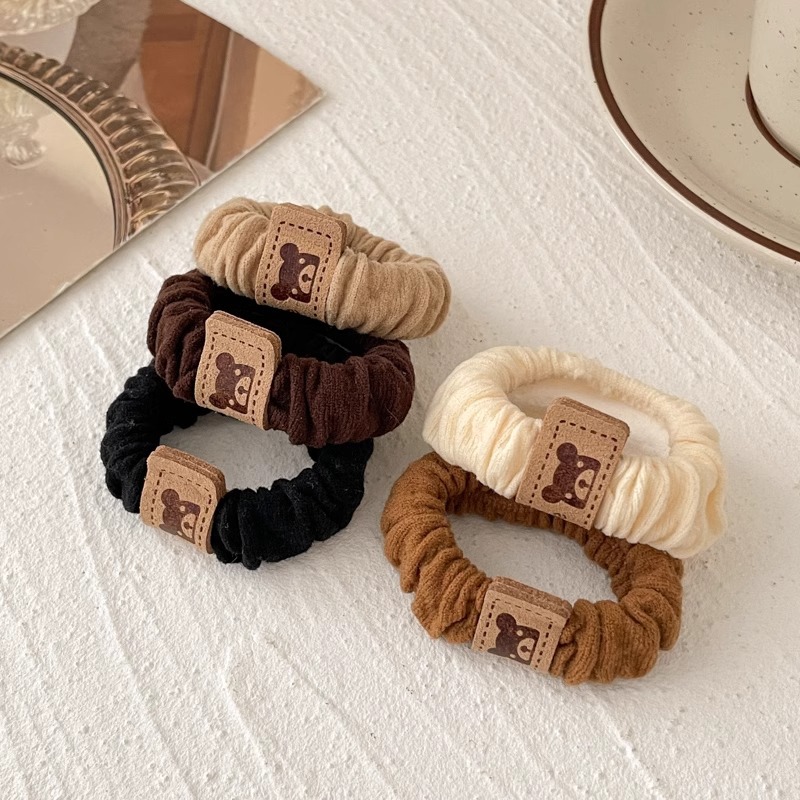 Oso anillo para el cabello rojo para mujer 2025 nuevo estilo de alta gama cuerda para el cabello banda de goma para el cabello alta elástica y duradera cuerda para el cabeza funda de cuero