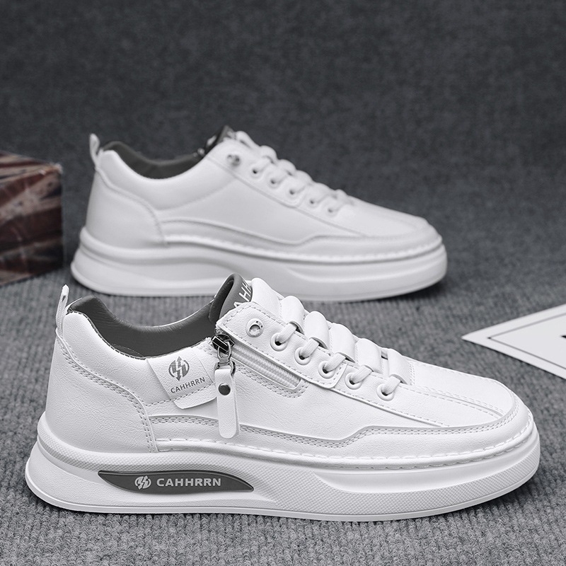 Zapatos de skate para hombres zapatos blancos bajos estudiantes 2025 nuevos zapatos de cuero casuales de primavera para hombres zapatos de moda con cremallera para adolescentes