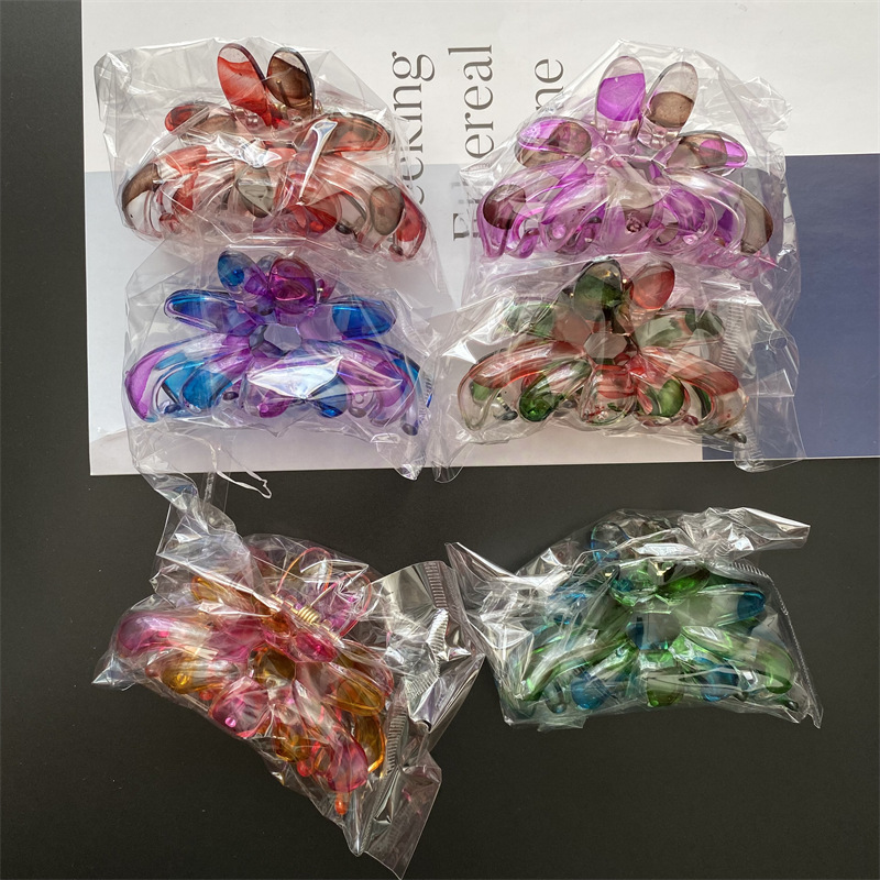 Punto de soplado de plástico onda de la nariz de vaca horquilla de pelo clip de agarre clip de ducha 2 yuanes dos yuanes tienda cabeza accesorios puesto suministro