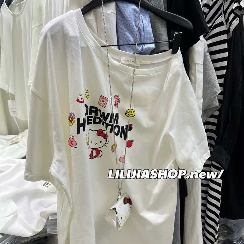 プラスサイズの漫画プリントオフショルダー半袖 Tシャツ女性のための夏 2025 新しいルーズ痩身カバー多用途トップ女性のための|undefined