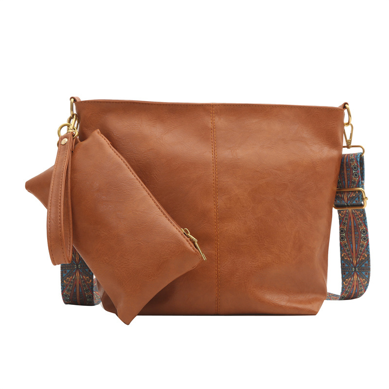 Nueva bolsa de hombro retro moda casual de gran capacidad bolsa de mano para mujeres 2024 moda de verano simple mochila