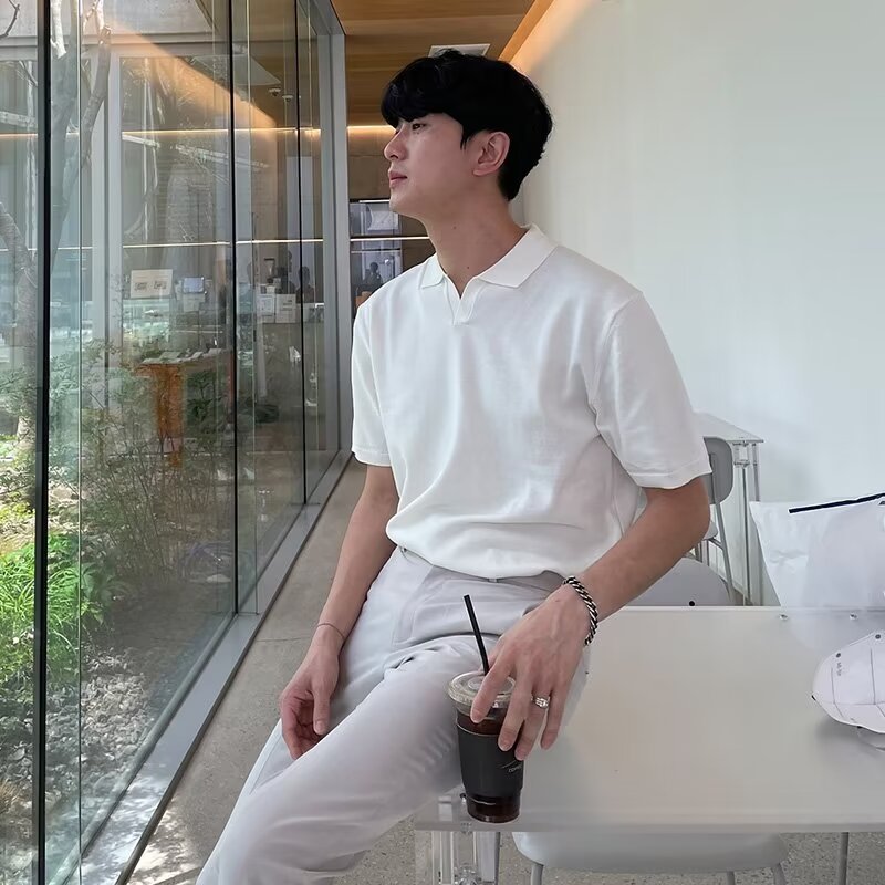 Moda coreana masculina suelta cuello en V cinco mangas de color sólido polo camisa de verano nueva marca de moda de algodón de perla camisa de manga corta