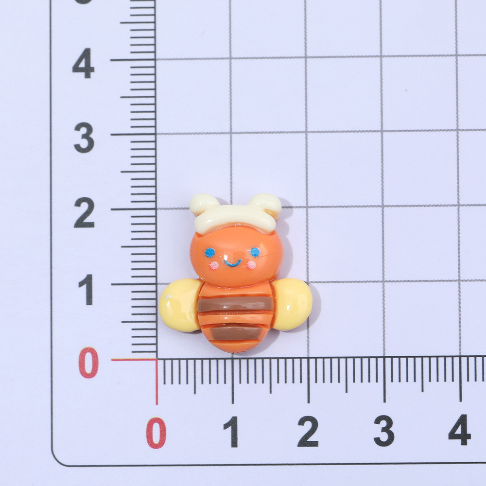 Macaron color pastoral abeja mariposa resina accesorios DIY crema pegamento accesorios para el cabello teléfono móvil Shell accesorios hechos a mano al por mayor