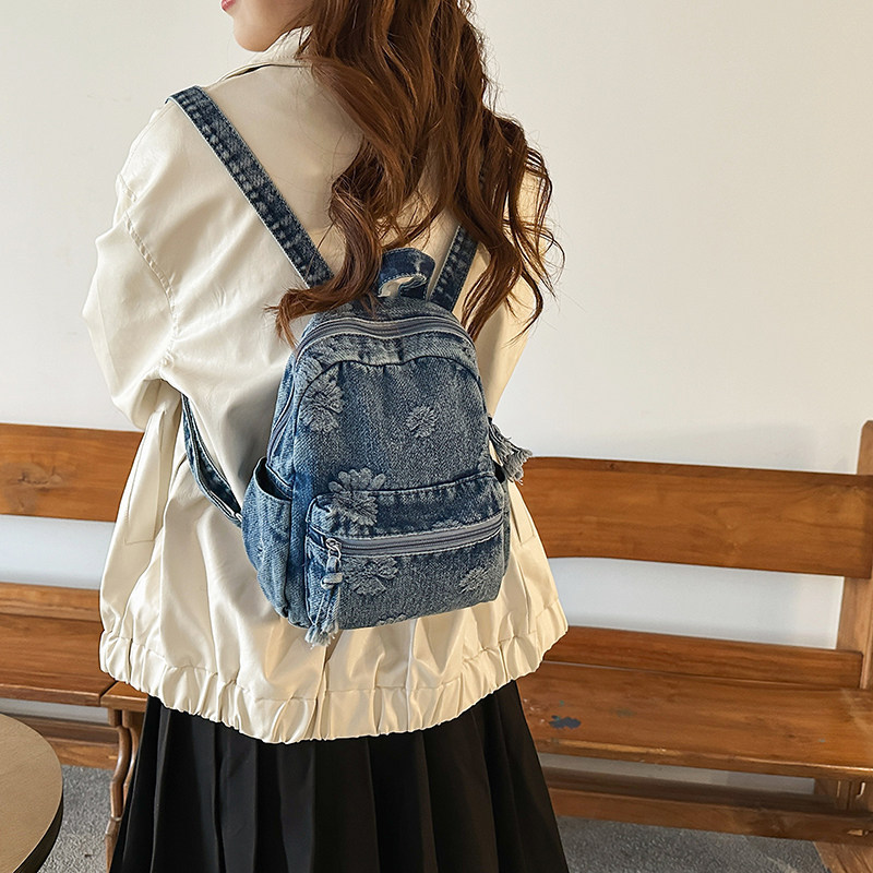 Mochila de denim japonesa retro 2026 nueva moda de mochila de viaje universal diaria