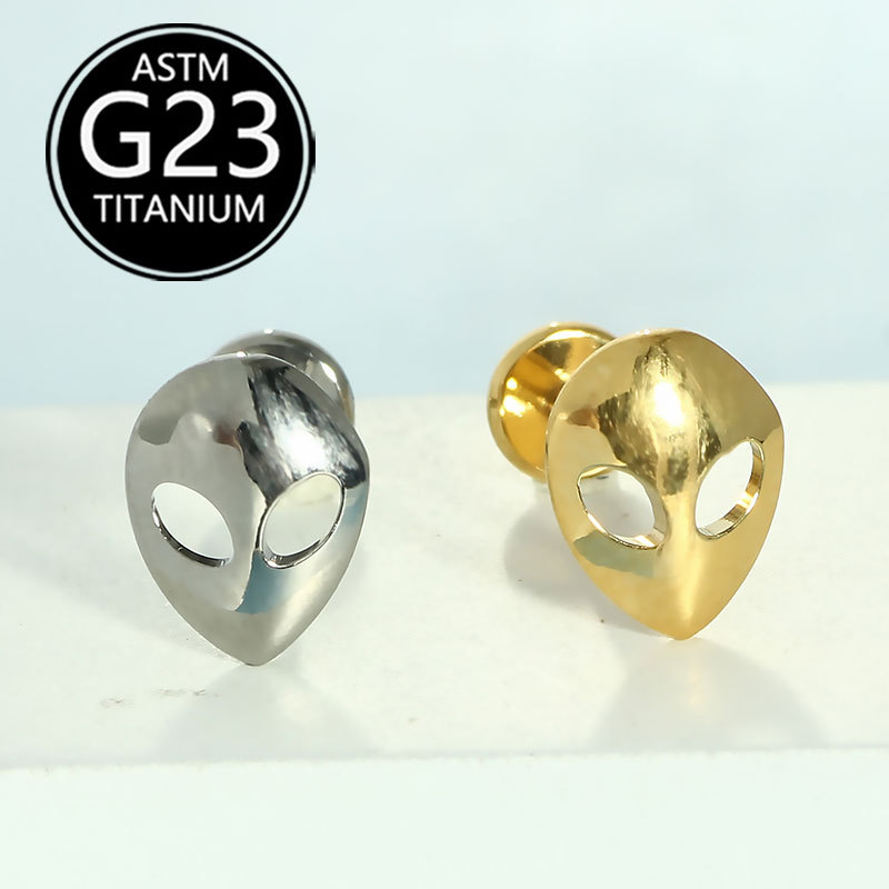 Silver pointed spike labret stud material detail