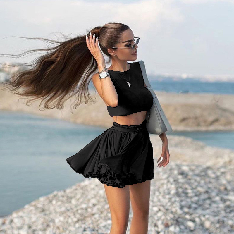 2025 transfronterizo Europa y América nueva moda de mujer estilo de vacaciones sexy chaleco con espalda abierta media falda casual de dos piezas para mujeres