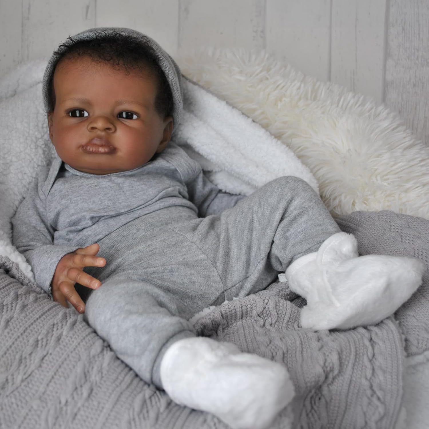 Marca NPK Muñeca de renacimiento de bebé de simulación de 19 pulgadas Muñeca de piel oscura Lanny oferta caliente transfronteriza
