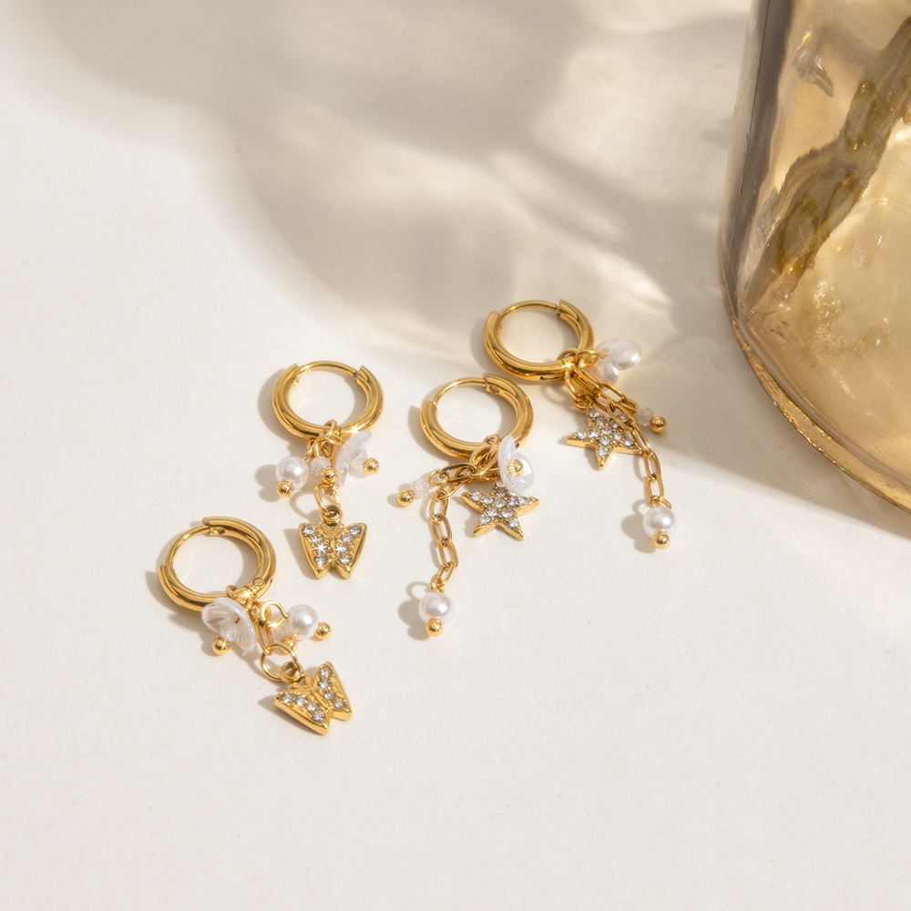 Wanxing Pendientes de perlas europeas y americanas Pendientes de acero inoxidable Pendientes de lujo ligero de alta gama Diseño de joyería de oro de nicho de 18 quilates