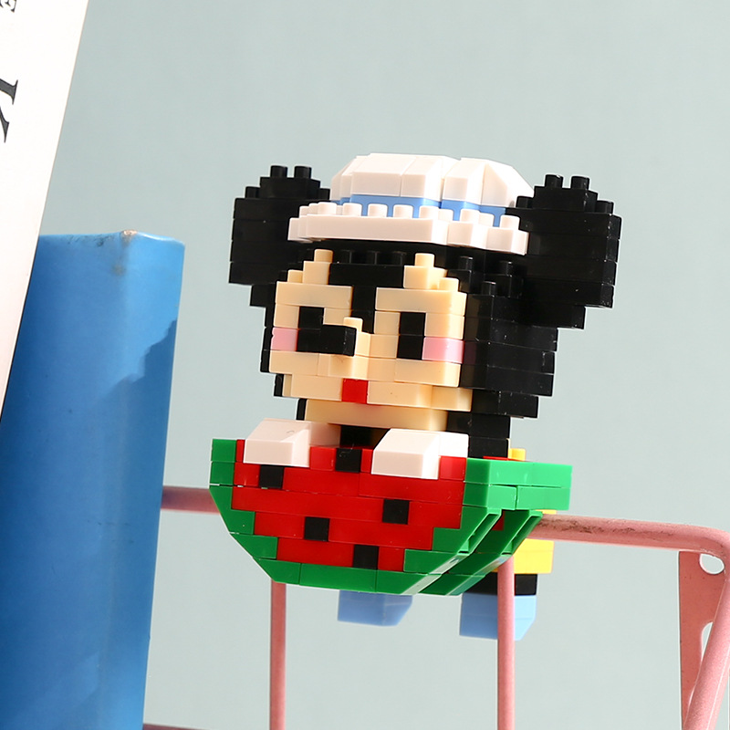 Compatible con LEGO gigante Panda flor azul lindo muñeca de dibujos animados montado bloques construcción juguete para niños puesto caja ciega al por mayor