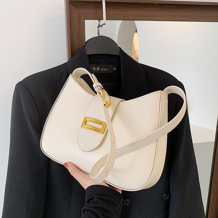 Bolso de axila súper fuego de verano para mujer 2025 nueva moda de nicho bolso de axila de alta gama textura bolso de mensajero de todo fósforo