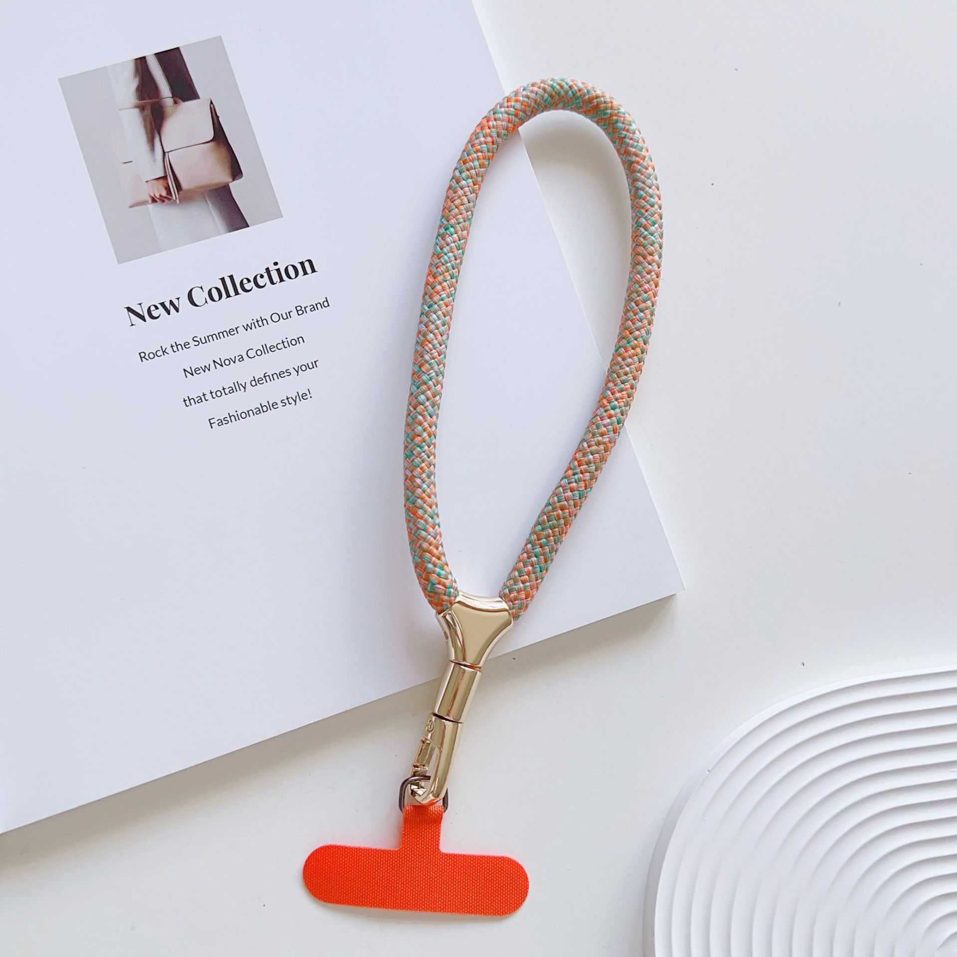 Cuerdas de muñeca ajustables de alta calidad con clips de hebilla pequeñas y frescas de poliéster corto para colgar teléfonos móviles simples y versátiles