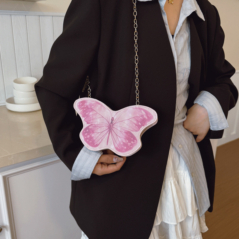 Dolce y lindo pequeña mariposa niña bolsa de hombro exquisita mini bolsa de cadena de bebé bolsa de cambio de comercio exterior transfronterizo para niños
