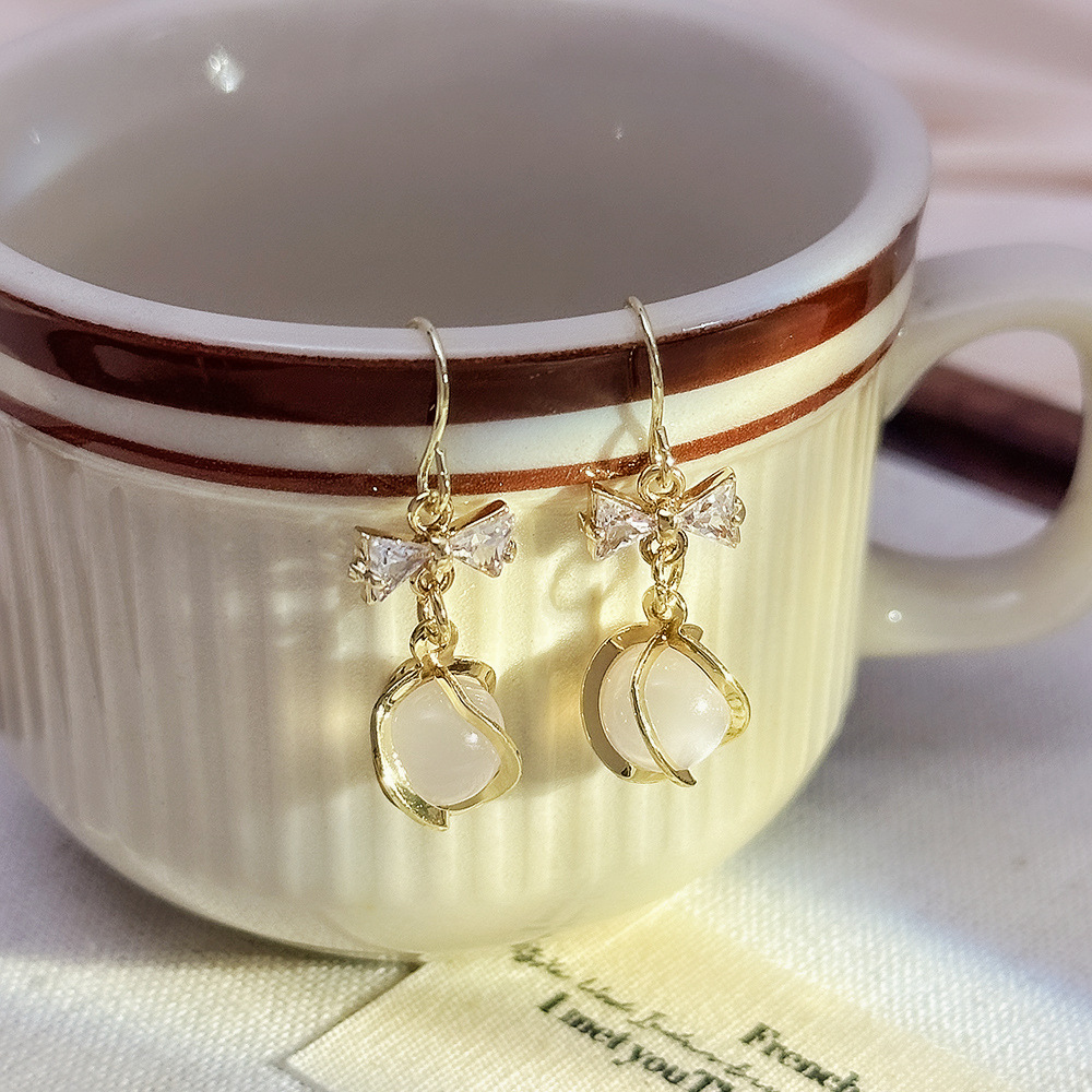 51 # borla de ojo de gato