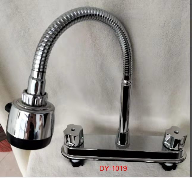 En stock transfronteriza de América del Sur grifo de agua caliente y fría pieza de cerámica doble interfaz de plástico grifo de la cocina a prueba de salpicaduras