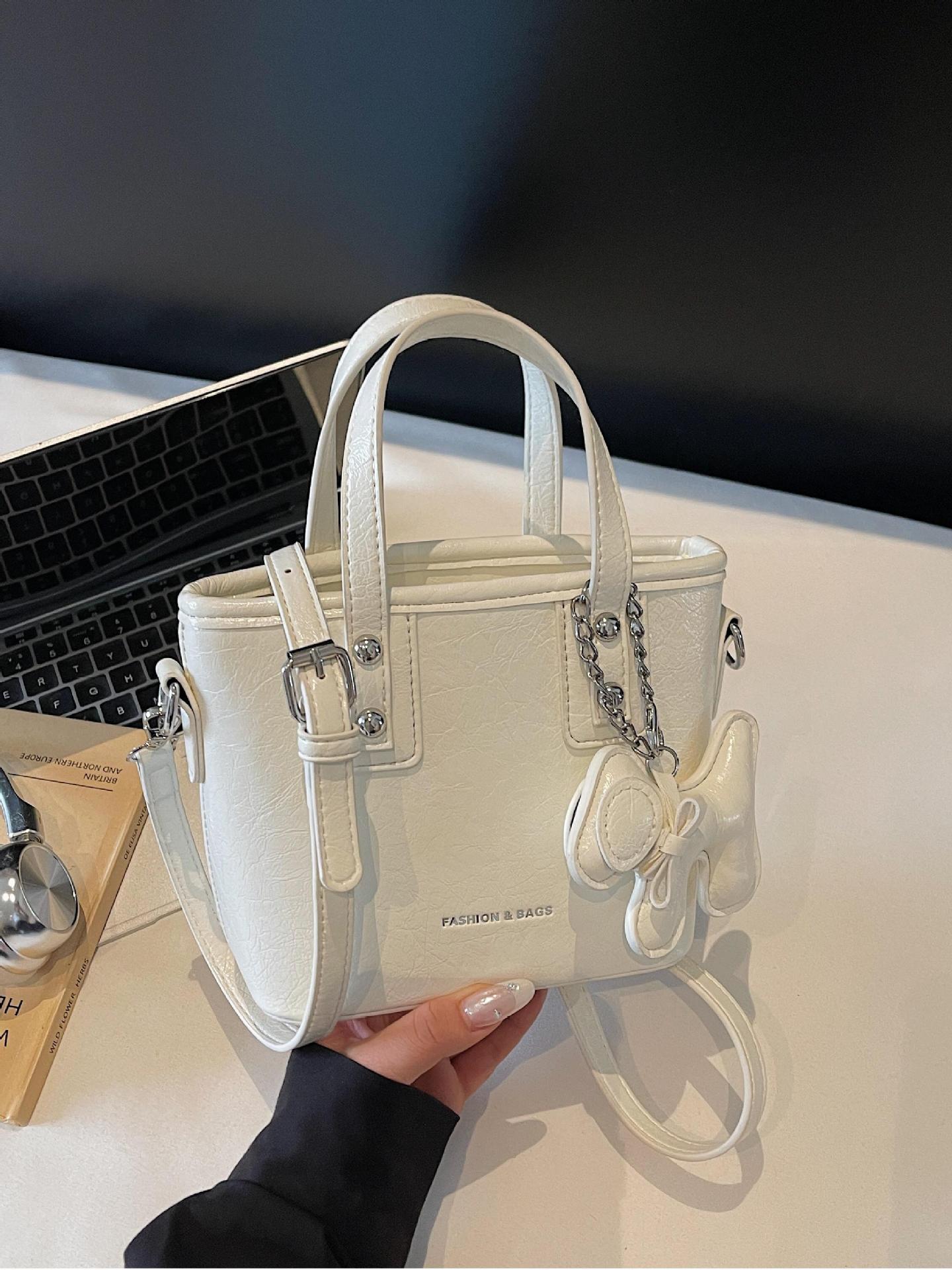 Bolso popular de este año para mujeres 2025, nuevo paquete de cubo de textura transfronteriza de alta calidad, moda versátil bolso de mochila superfuego