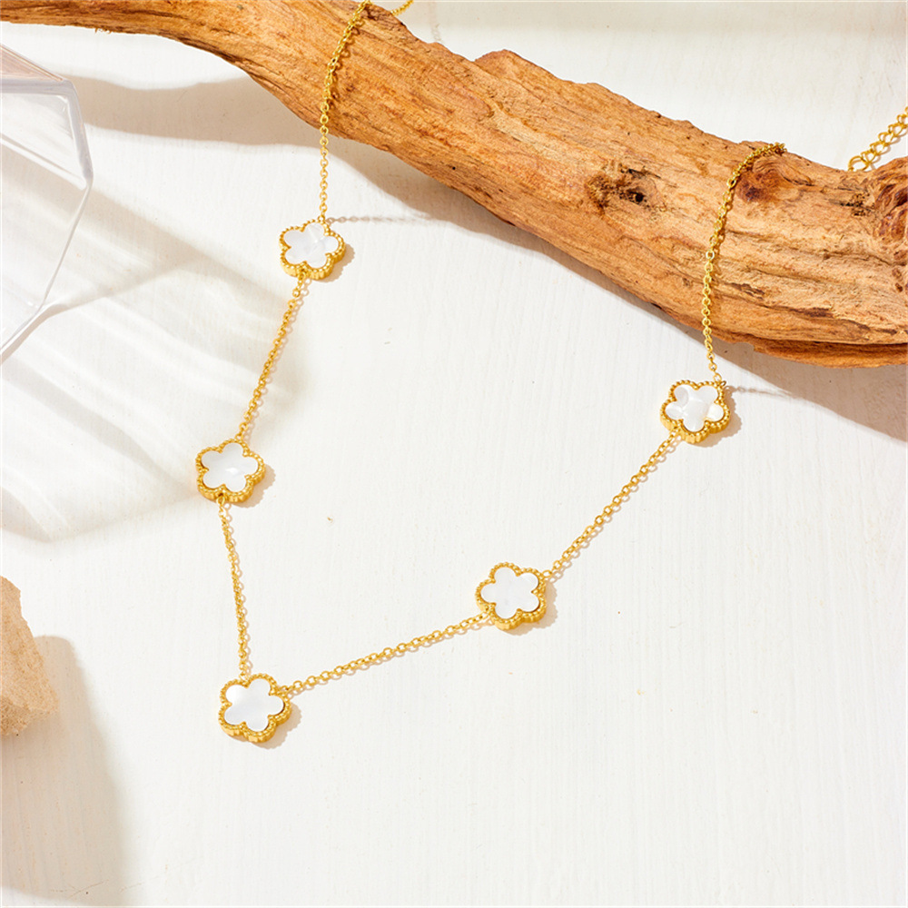 Nueva moda europea y americana no-desvanecimiento de acero de titanio de cinco hojas serie de trébol de moda de lujo ligero espárragos pulsera collar traje