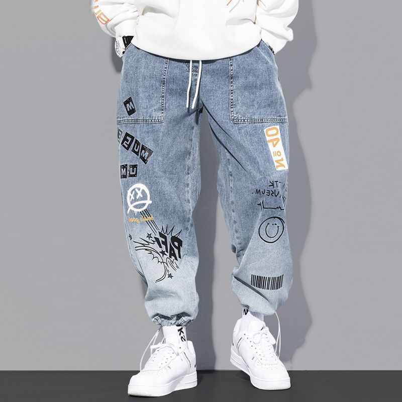 Jeans marca de moda para hombres rap hip hop Pantalones rectos de pierna ancha graffiti dibujos animados gradiente de moda suelta pantalones harén atados al tobillo