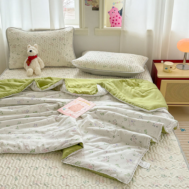Estera de látex de seda de hielo de verano Juego de cuatro piezas de edredón fresco de verano 2025 nuevo edredón de aire acondicionado cama de dormitorio juego de cuatro piezas de edredón de verano