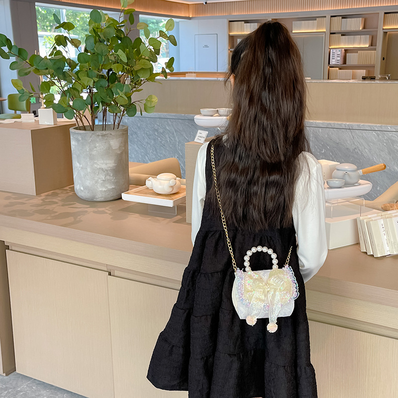 Estilo coreano de los niños bolsa de moda princesa arco bolso de estilo occidental chica estilo Chanel cadena mensajero bolsa de hombro