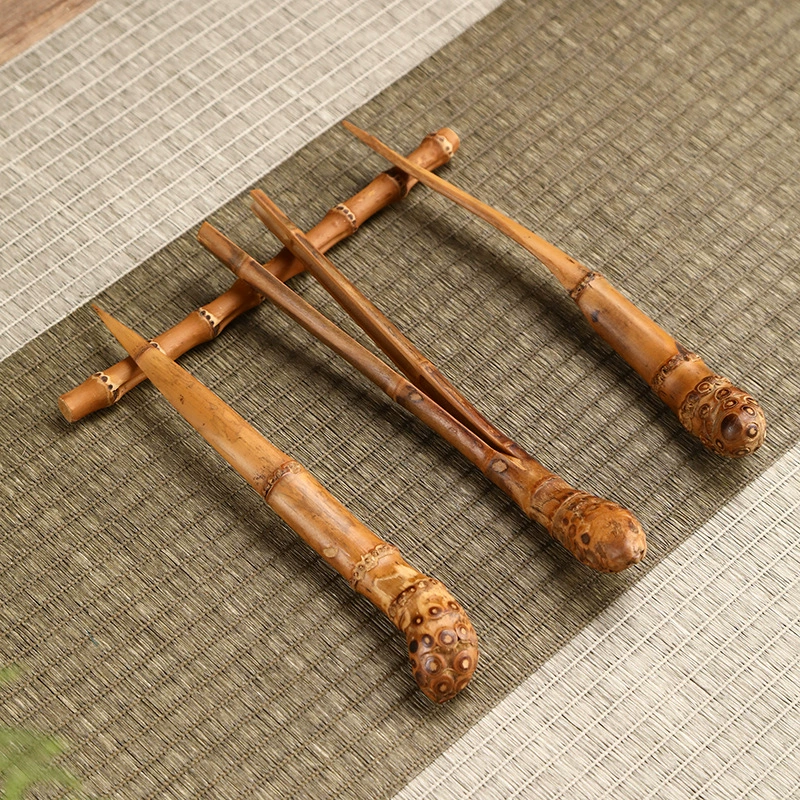 Carved tea set with accessories, 4 piece set