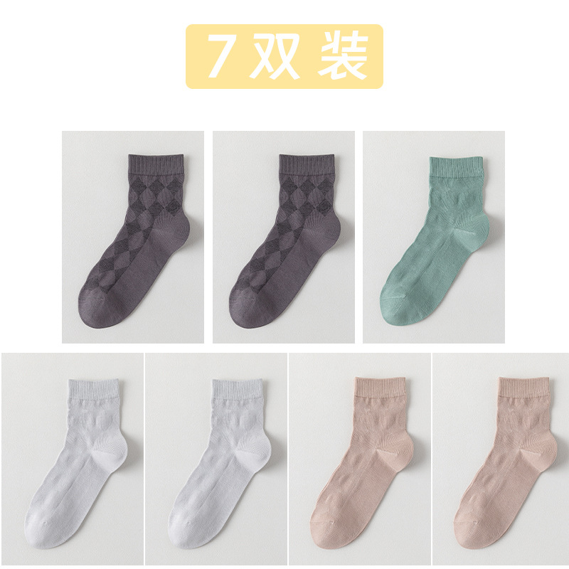 Calcetines de algodón de color sólido para hombres primavera y otoño medio tubo de diamante sin hueso transpirable absorción de sudor embalaje independiente calcetines de hombre al por mayor