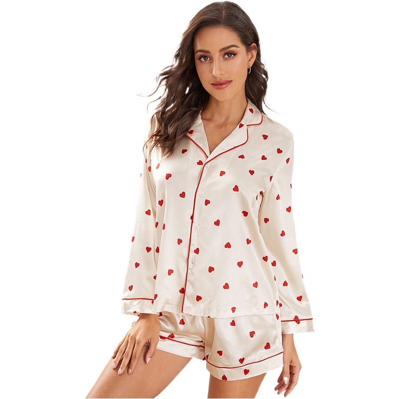 Conjunto de dos piezas de pijama de seda sintética con estampado de corazón para mujer, estilo nuevo de primavera, de manga larga, se puede usar fuera de casa