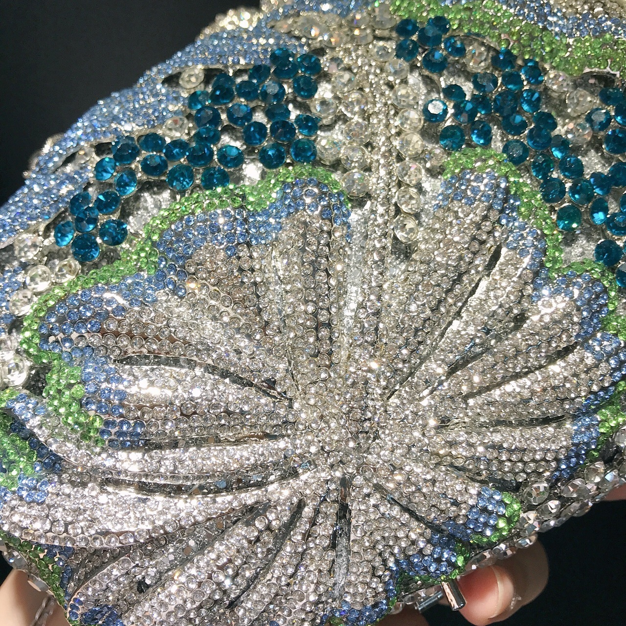 Selección estricta de flores huecadas transfronterizas, bolsas de banquete de diamantes, bolsas de maquillaje de diamantes, embrague de gemas azules