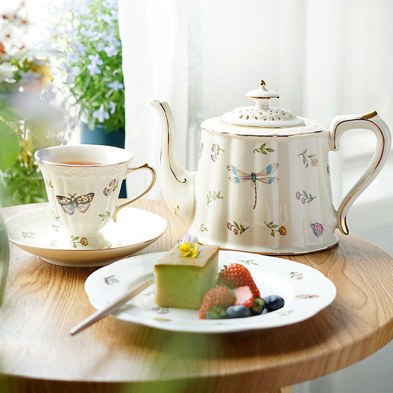 Juego de tazas y platillos de café de cerámica retro británica Juego de té de la tarde de estilo europeo Tazas para el hogar francesas Ventas directas de fábrica