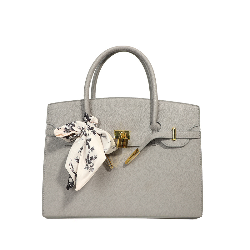 Decoración de bolso retro europeo y americano, bolso tote Kelly de gran capacidad y lujo ligero para mujer, nuevo estilo 2025, simple y versátil, estilo coreano.