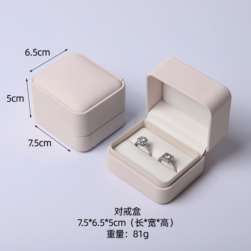 Caja de joyería rosa de alta calidad de cuero pu caja de embalaje de marca de joyería logotipo colgante pulsera collar caja de anillo