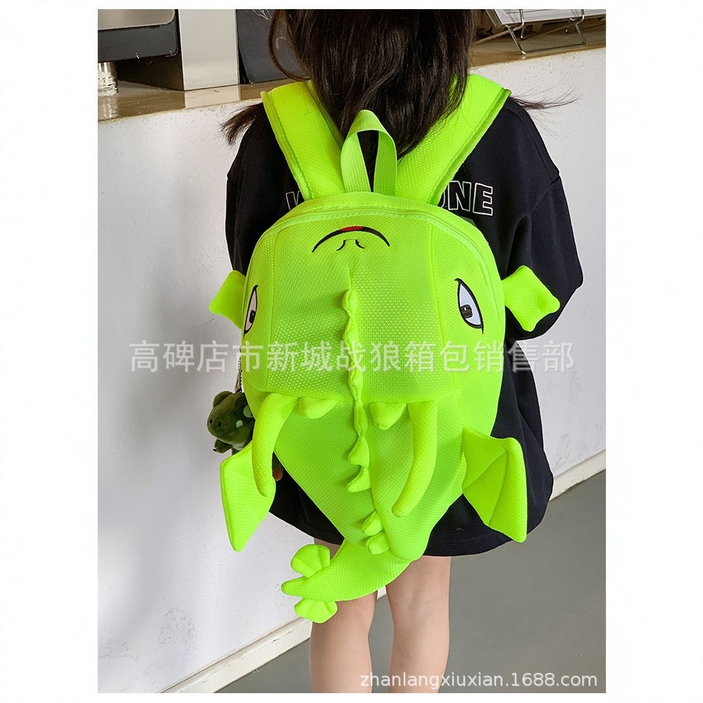 Children's dinosaur-shaped backpack, cute cartoon style, suitable for boys and girls, trendy and fun.