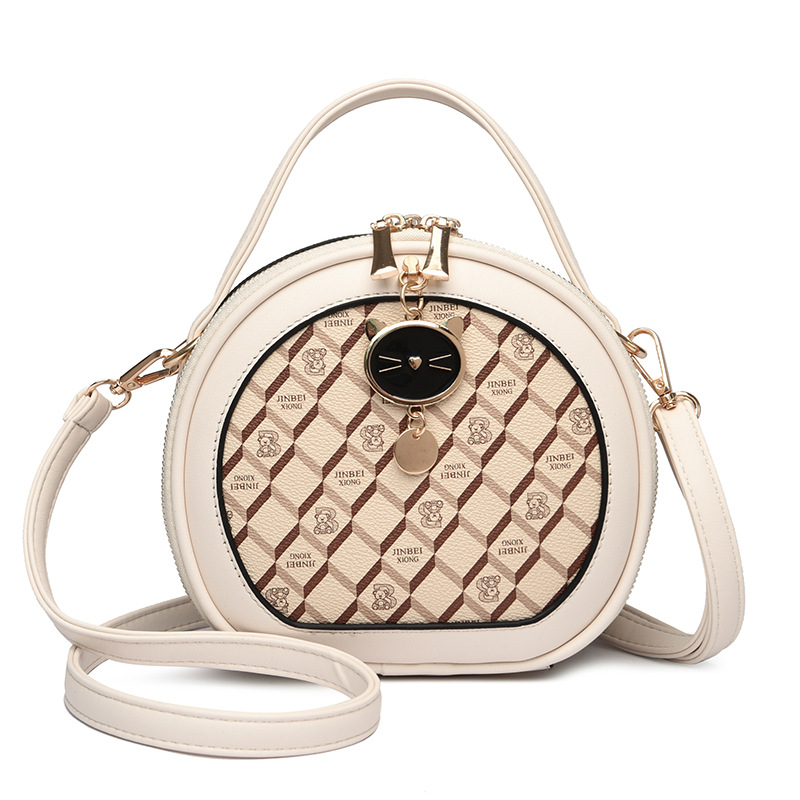 La nueva bolsa redonda impresa a mano de primavera 2023 tiene una piel suave de 98.501 hombros.