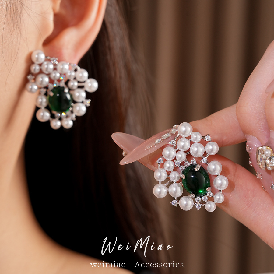 Agujas de plata de piedra de perla oval pendientes de perla estilo palacio delicado pendientes de nicho ligero lujo alta sensación auriculares al por mayor
